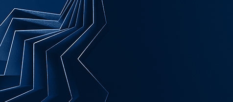 Zig zag streaks of light against a dark blue background